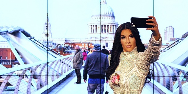 LONDON, ENGLAND - JULY 09: Madame Tussauds unveil a new wax figure of Kim Kardashian which takes selfies against changing location backdrops at Madame Tussauds on July 9, 2015 in London, England. (Photo by Tabatha Fireman/Getty Images)