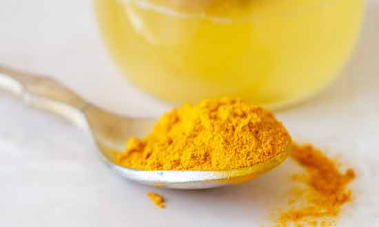 Turmeric with Honey and Almond Oil Natural Ways to Lighten Dark Knees and Elbows At Home